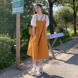 吊带连衣裙女春季2023新款学生森系宽松遮肚子单排扣外穿过膝长裙