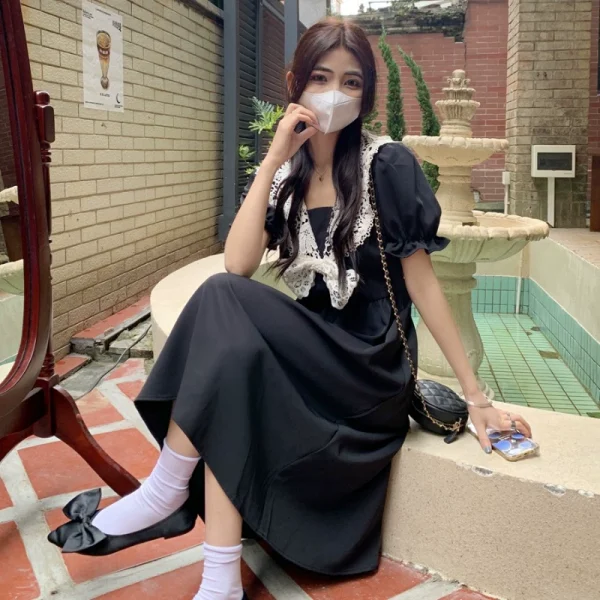 泡泡袖连衣裙女装春季赫本风法式小黑裙收腰显瘦别致设计感长裙子 - 图片 2
