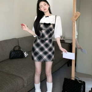 复古格纹蝴蝶结吊带连衣裙2024春款女装包臀裙小个子学院风短裙子