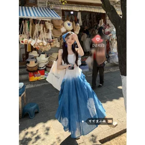 可可里小姐海边度假风扎染吊带连衣裙女夏季气质收腰A字大摆长裙
